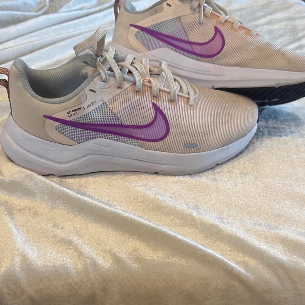 Nike Revolution Women's Cream and Purple Sneakers